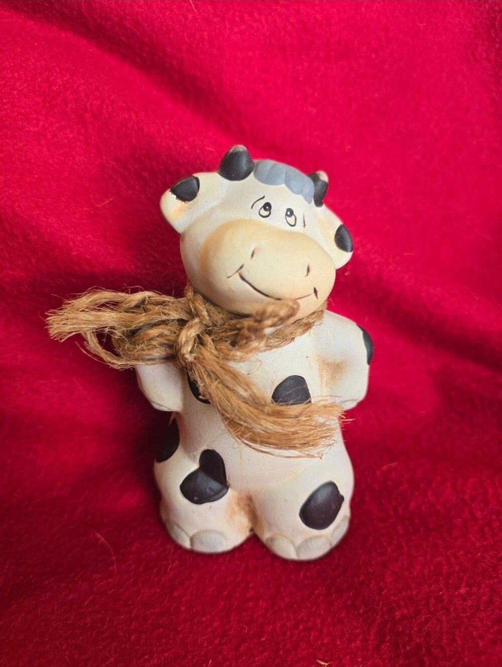 White & Black Cow Figurine with Twine Scarf